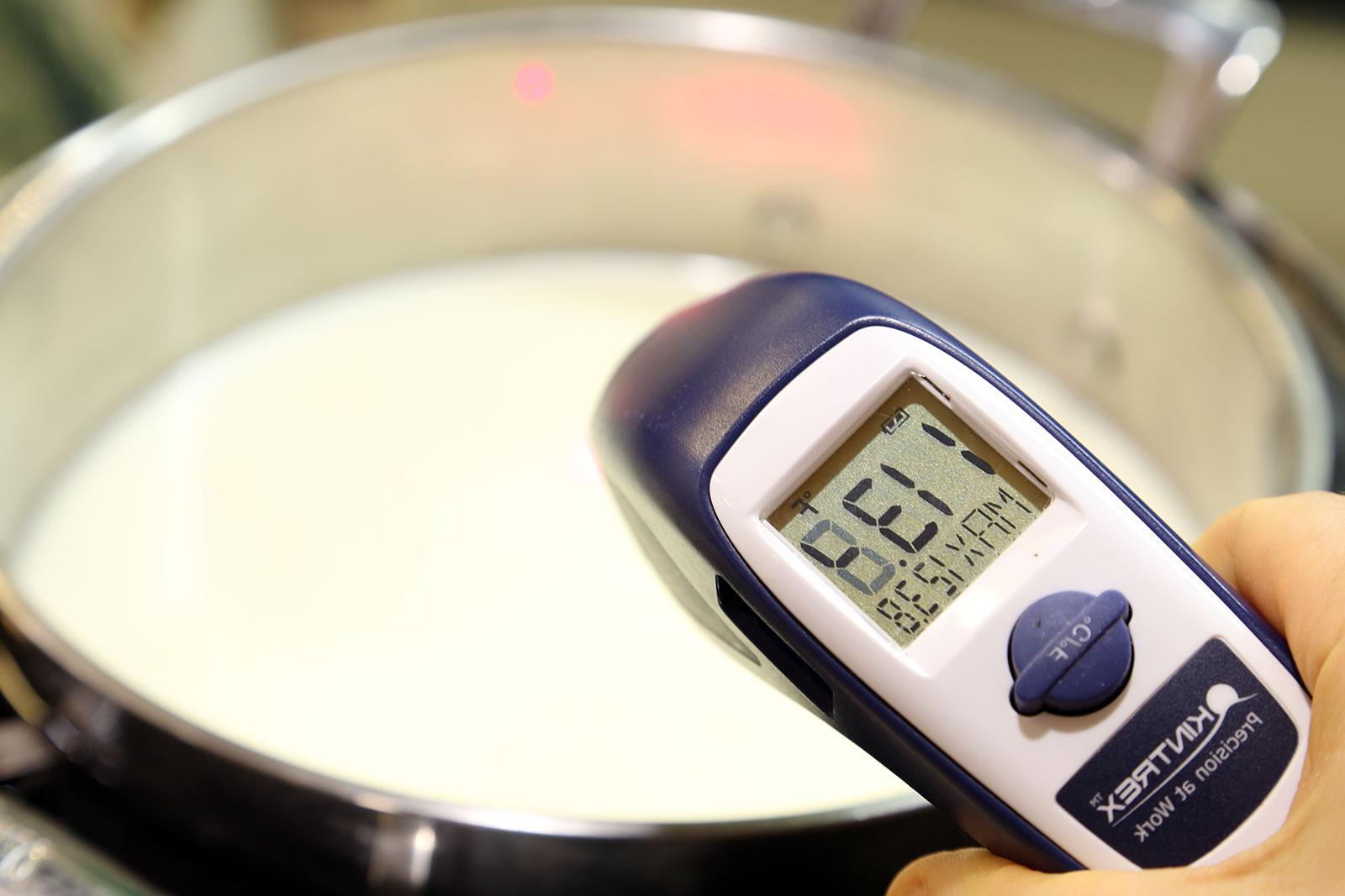 The heated and cooled milk is ready to be poured into jars with yogurt culture.